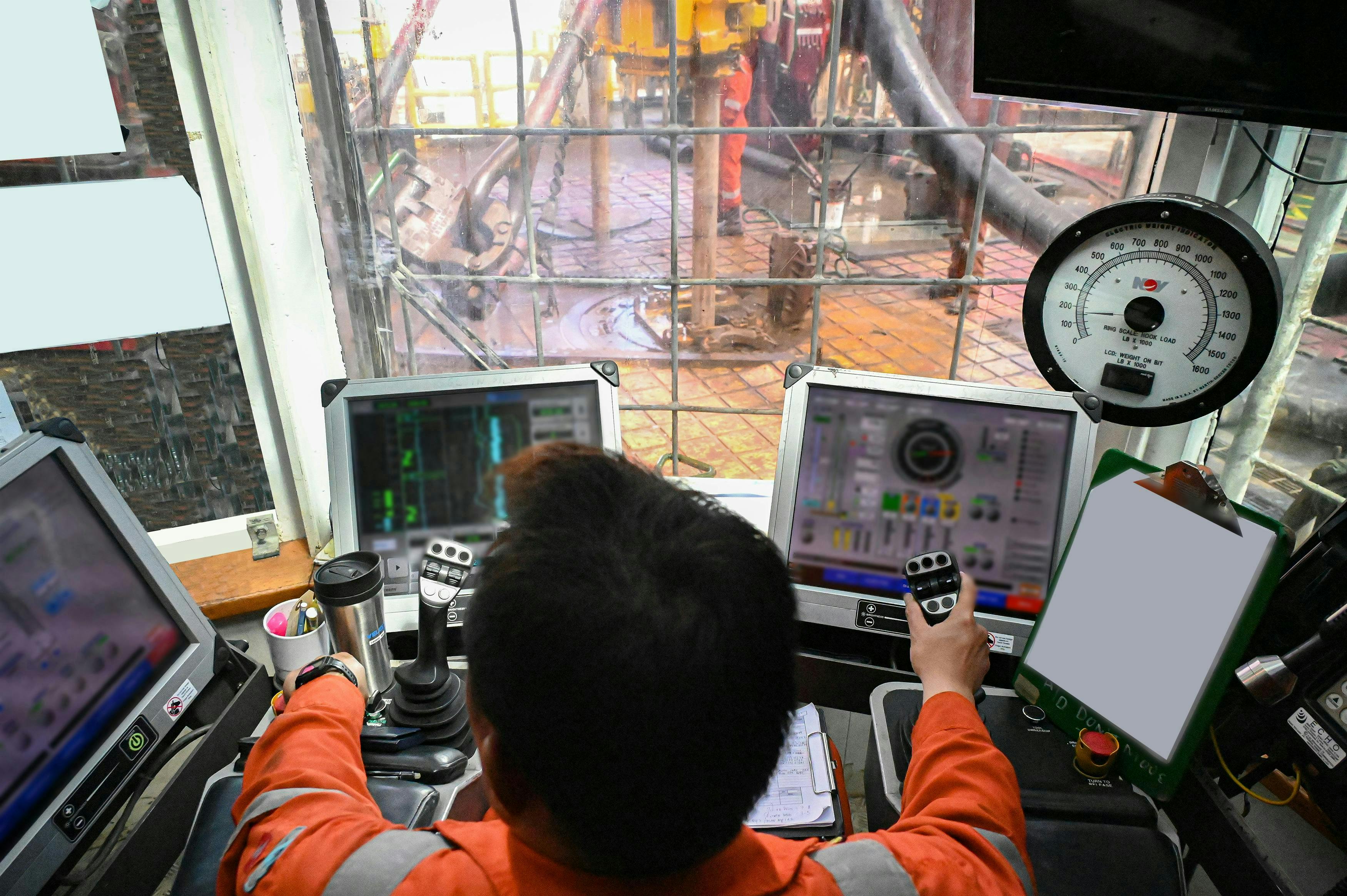 Monitoring operations from a drillfloor cabin. Monitoring operations from a drillfloor cabin.