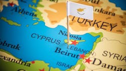 Cyprus marked with its flag on a map. Cyprus marked with its flag on a map.