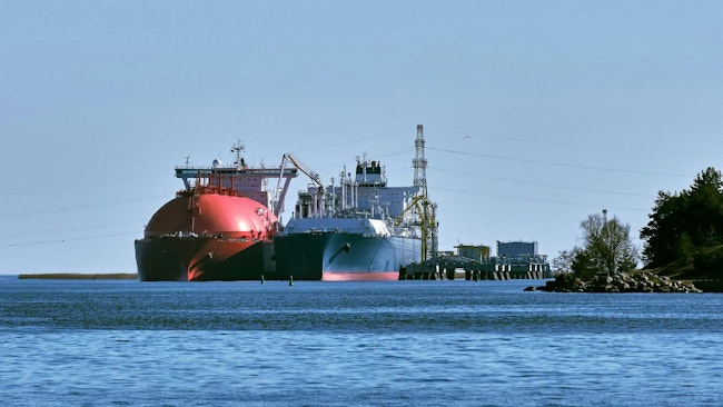 LNG tanker and FLNG terminal in port.