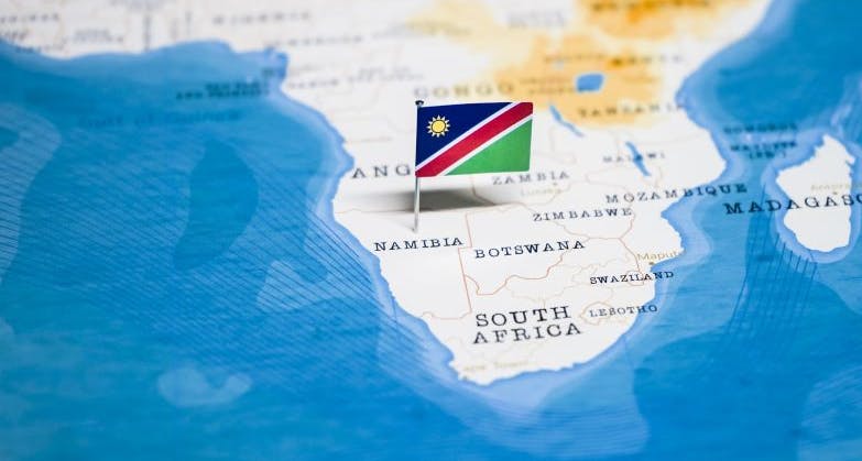Flag of Namibia on a map of Africa.