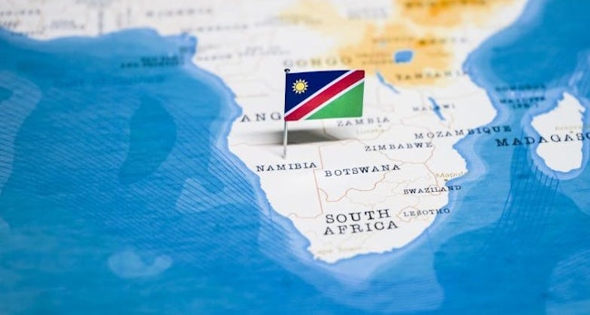 Flag of Namibia on a map of Africa.