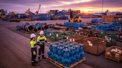 AI-generated image depicts workers prepping oilfield equipment rentals AI-generated image depicts workers prepping oilfield equipment rentals