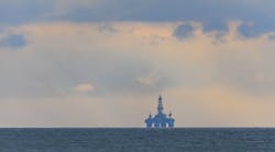 Deepwater rig on the horizon at sea Deepwater rig on the horizon at sea
