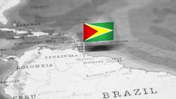 flag of Guyana pinned on a map of South America flag of Guyana pinned on a map of South America
