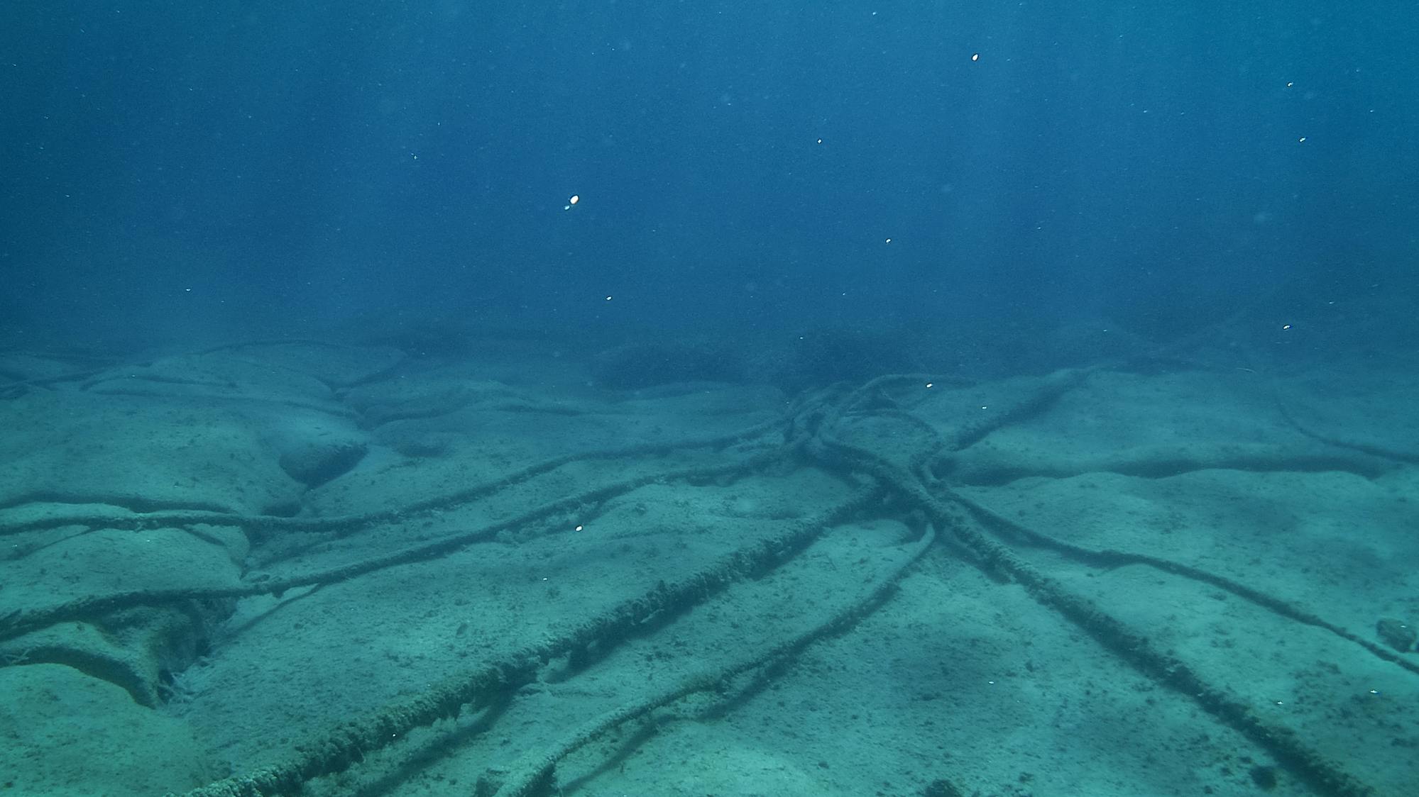 Underwater cables on the ocean floor in the Mediterranean Sea