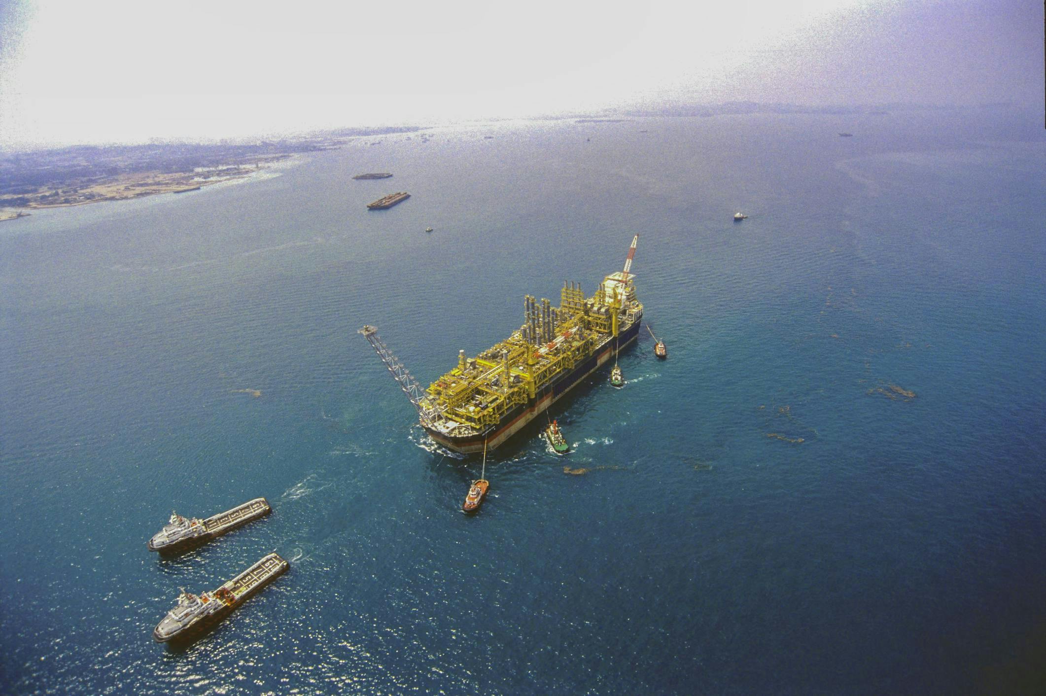 offshore FPSO being towed by vessels offshore FPSO being towed by vessels