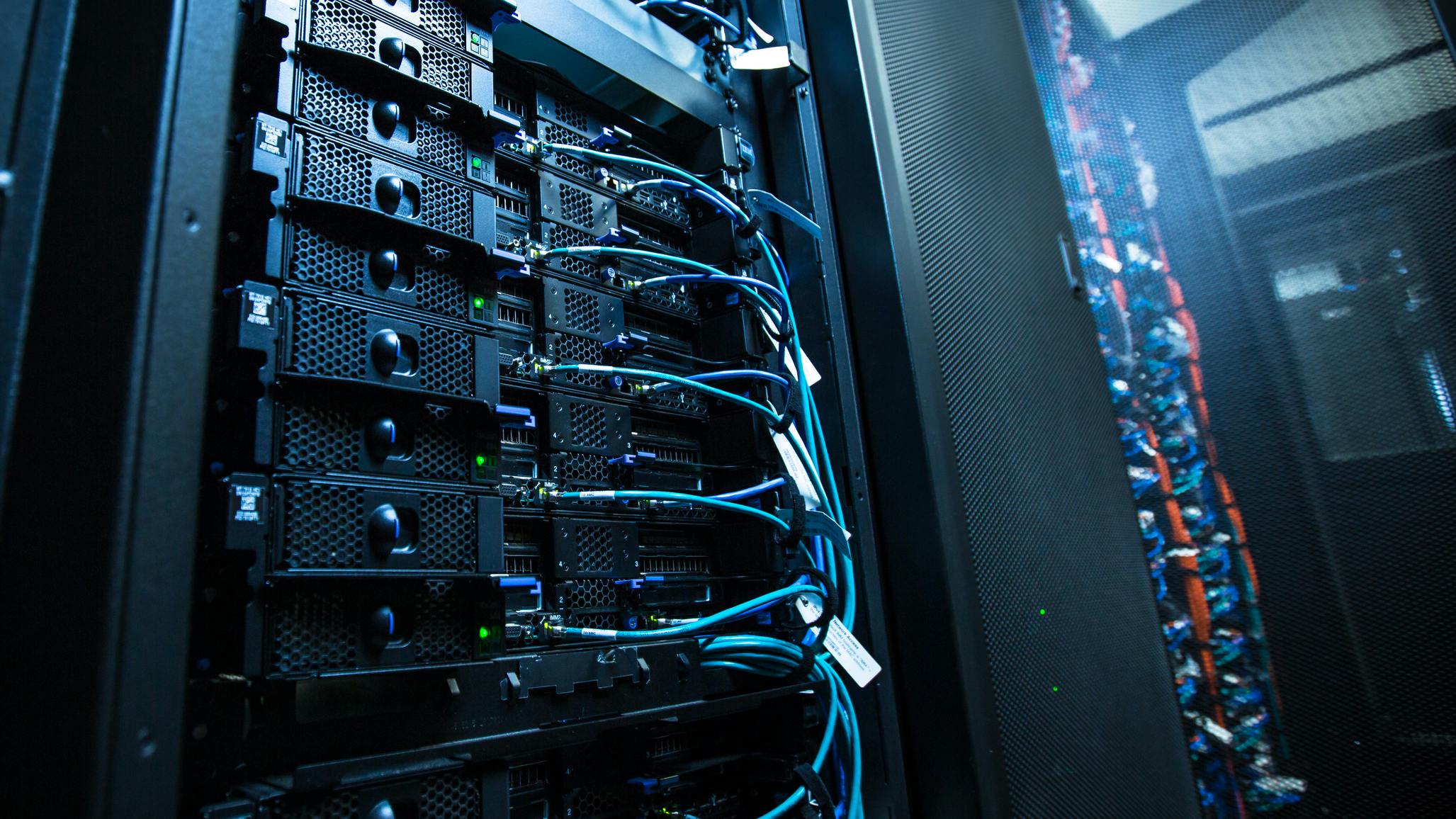 Network server room with servers/high performance computers running processes
