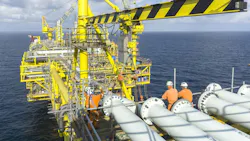 Offshore workers on oil and gas platform in South China Sea Offshore workers on oil and gas platform in South China Sea