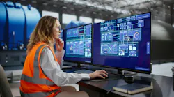 Female Engineer Monitors SCADA System In Oil And Gas Plant