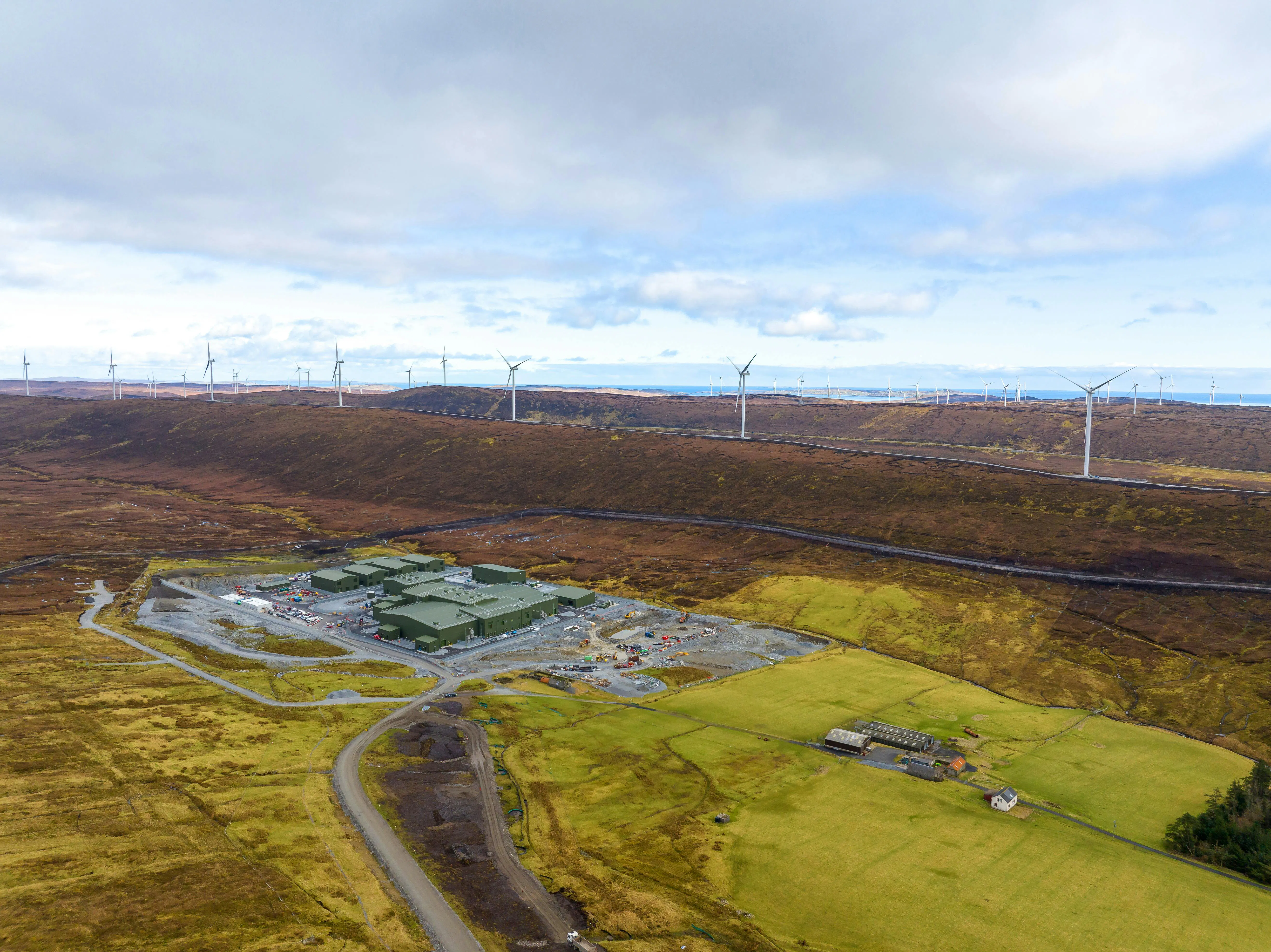 Hitachi Energy drone aerial view of onshore wind farm and infrastructure