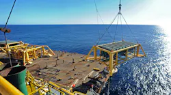 subsea module is lowered into Bass Strait Victoria during construction of an offshore platform