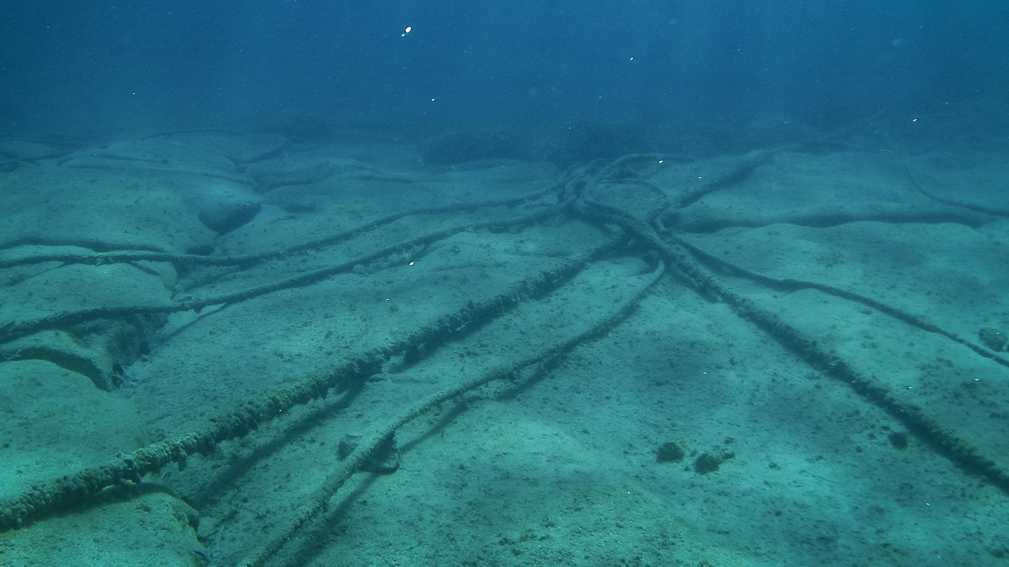 Underwater cables on the ocean floor in the Mediterranean Sea