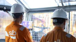 SLB personnel monitor offshore operations