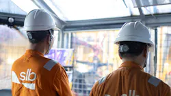 SLB personnel monitor offshore operations