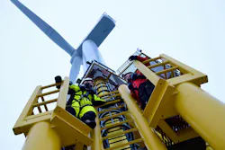 Technicians access an offshore wind turbine at RWE's Nordsee Ost wind farm