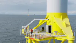 A technician works on an offshore wind turbine foundation