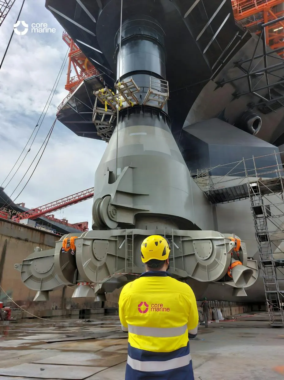 Large mooring/turret structure with CoreMarine engineer in foreground