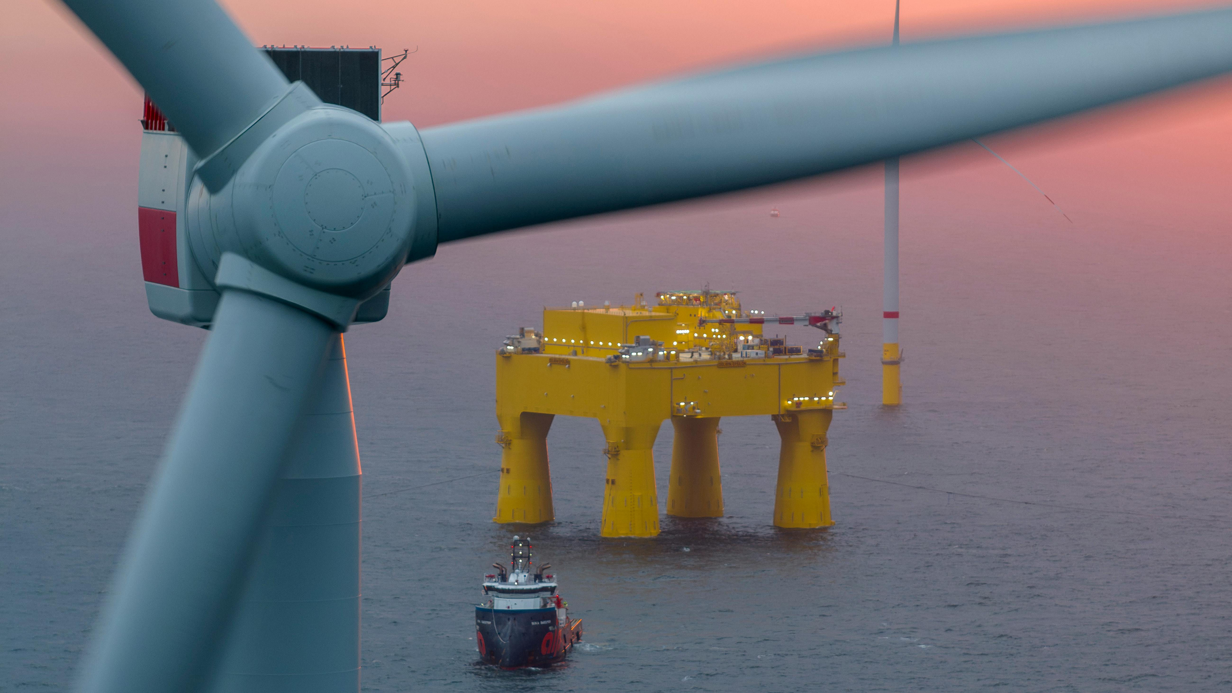 offshore converter platform operates among wind turbines in the German North Sea