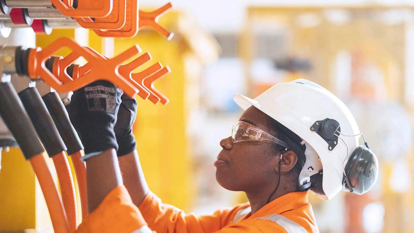 personnel with electrical /equipment work in a facility setting