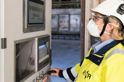 engineer with control panel / monitoring screen